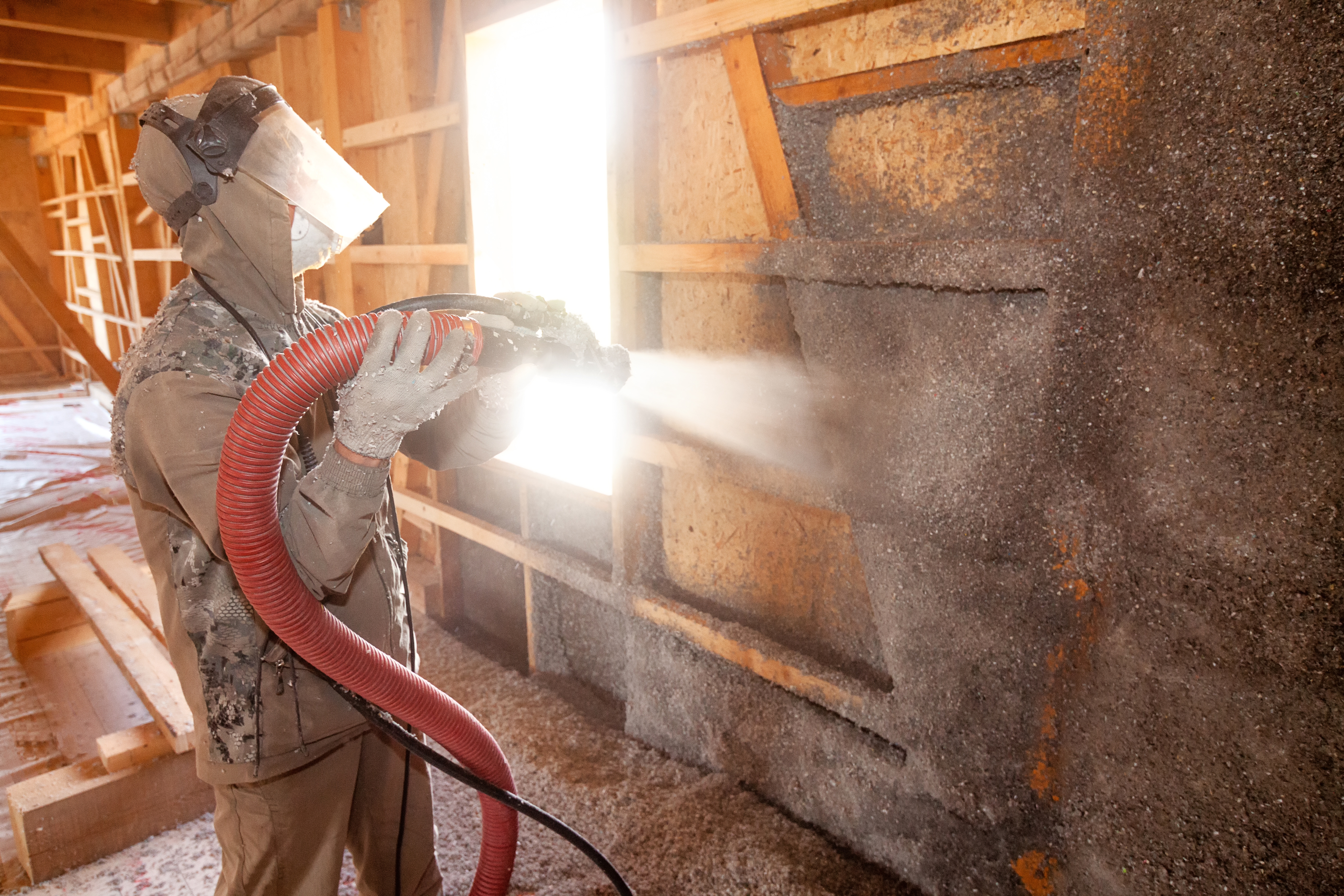 Damp-spray cellulose insulation